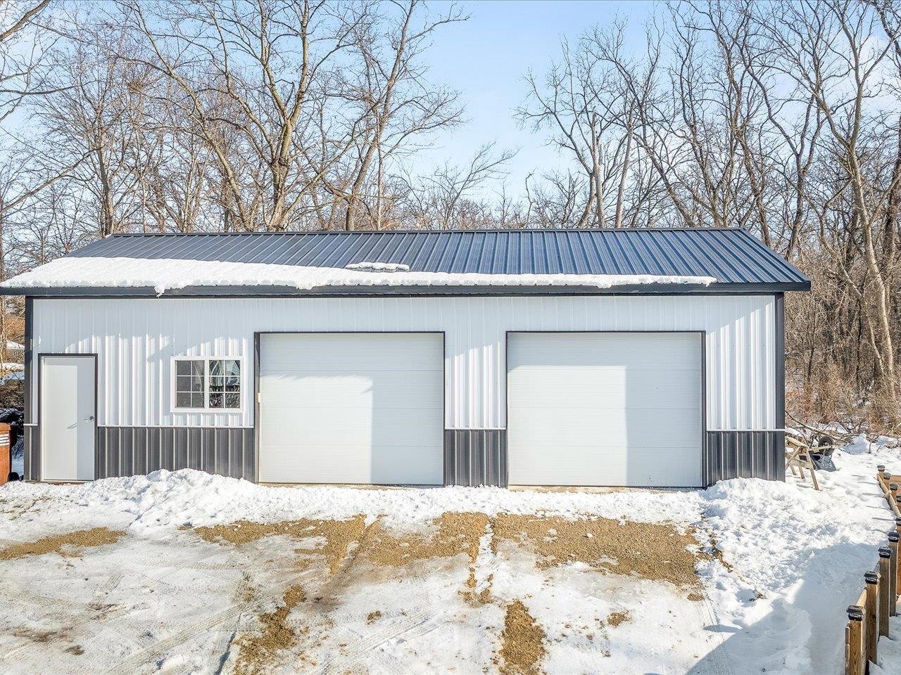 13005 Mitchell Street Shirland, IL 61079 - Photo 27 of 37 a view of a house with a snow and yard