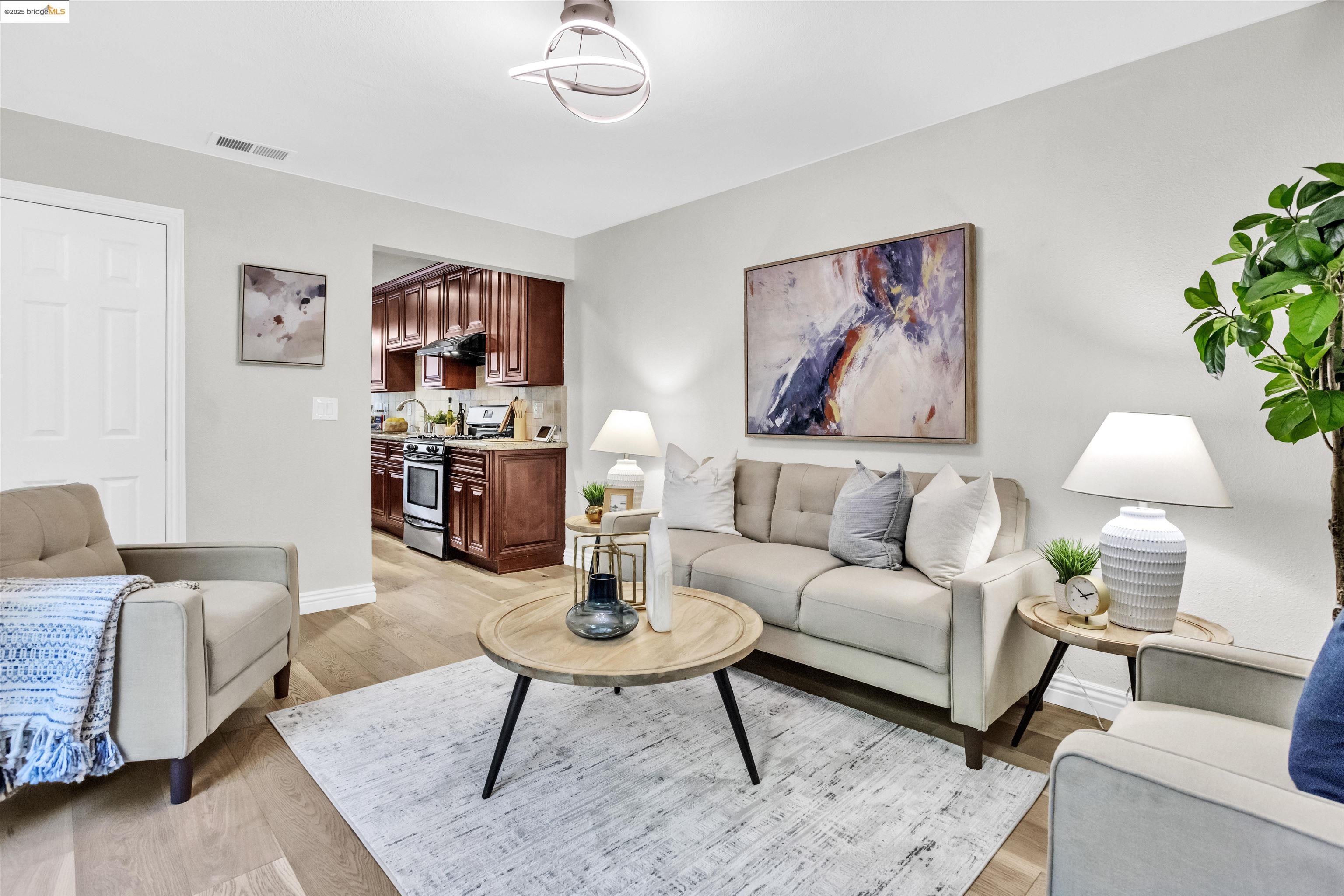 1905 Cannon Place Walnut Creek, CA 94597 - Photo 14 of 40 a living room with furniture and a potted plant