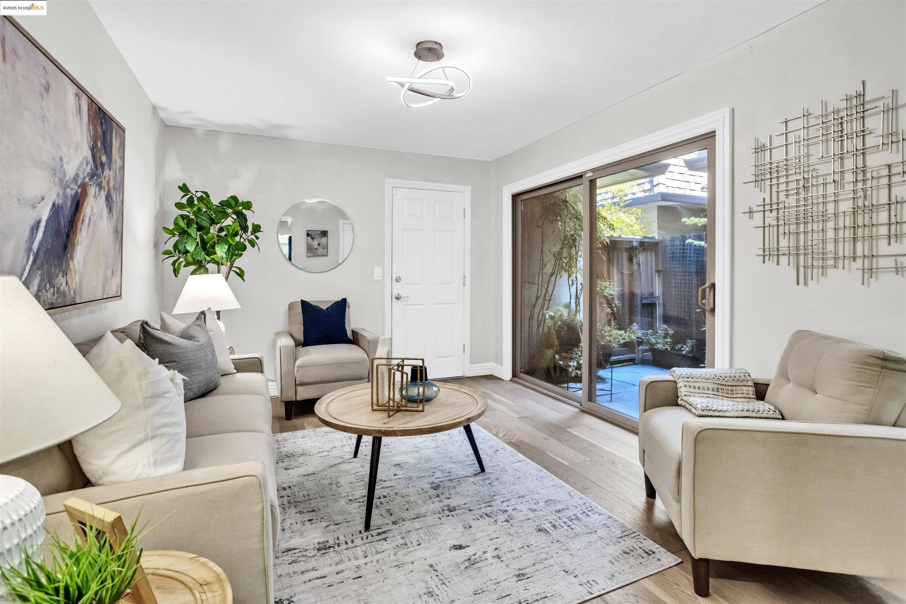 1905 Cannon Place Walnut Creek, CA 94597 - Photo 16 of 40 a living room with furniture and a potted plant