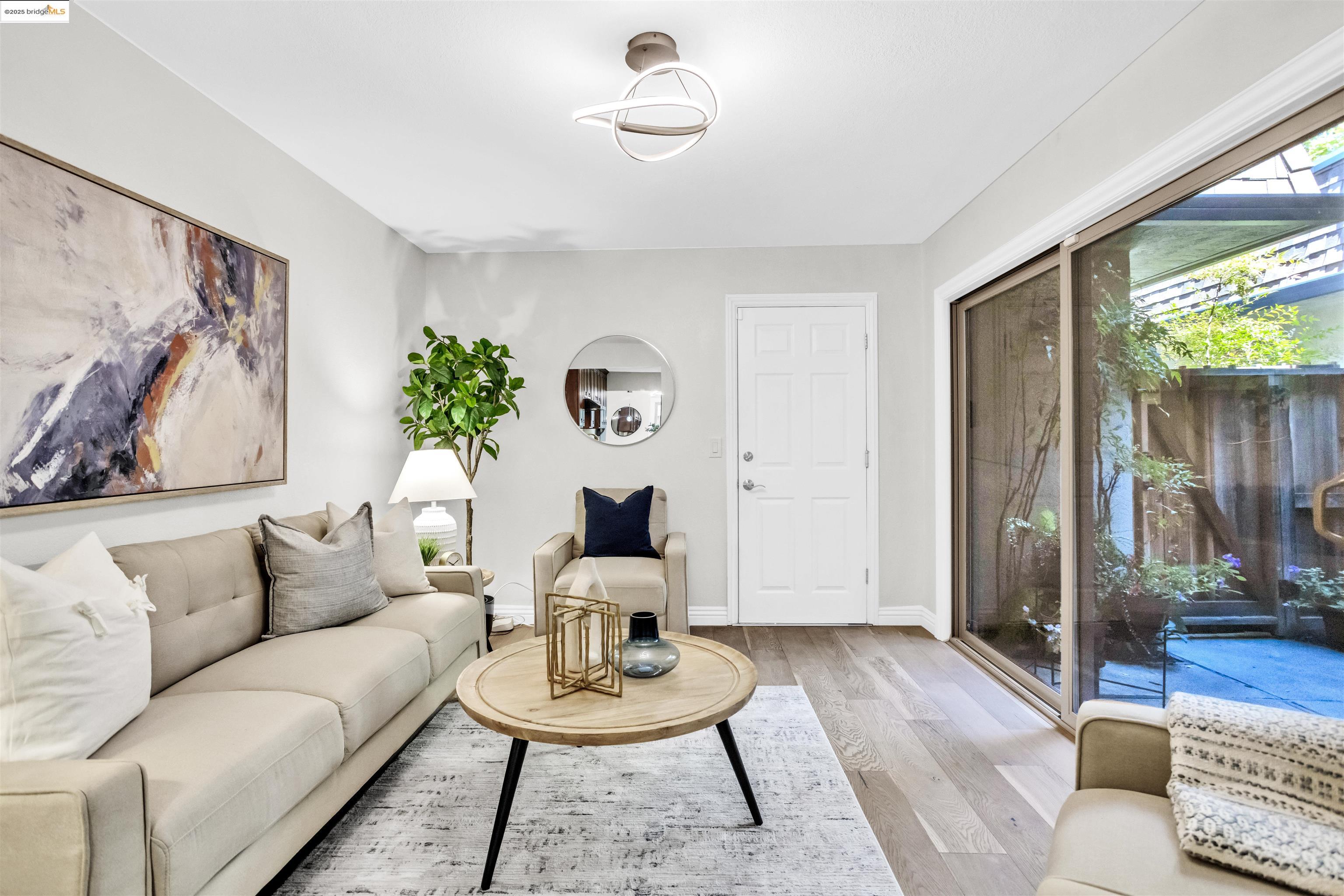 1905 Cannon Place Walnut Creek, CA 94597 - Photo 17 of 40 a living room with furniture and a large window