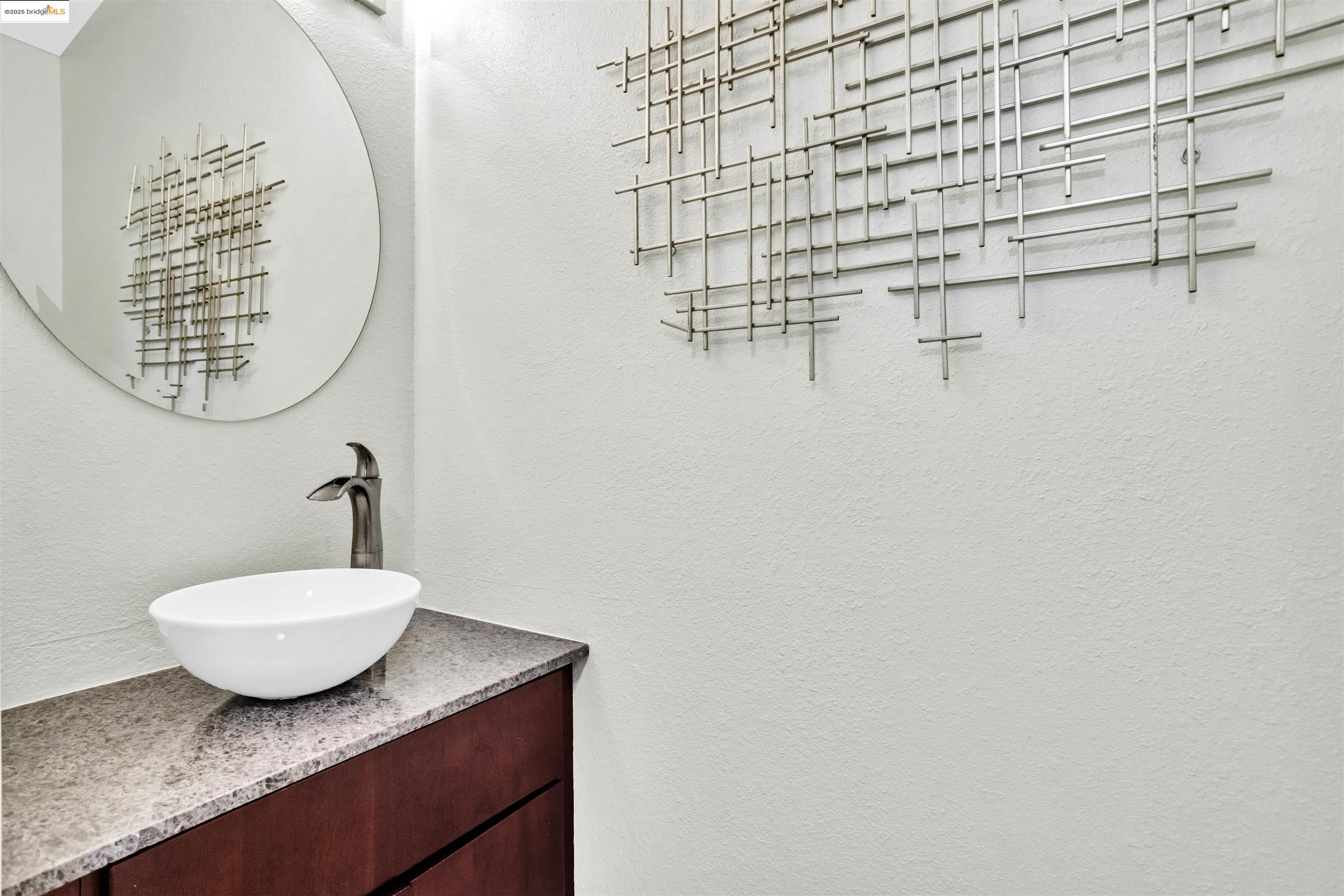 1905 Cannon Place Walnut Creek, CA 94597 - Photo 18 of 40 a bathroom with a sink and a mirror