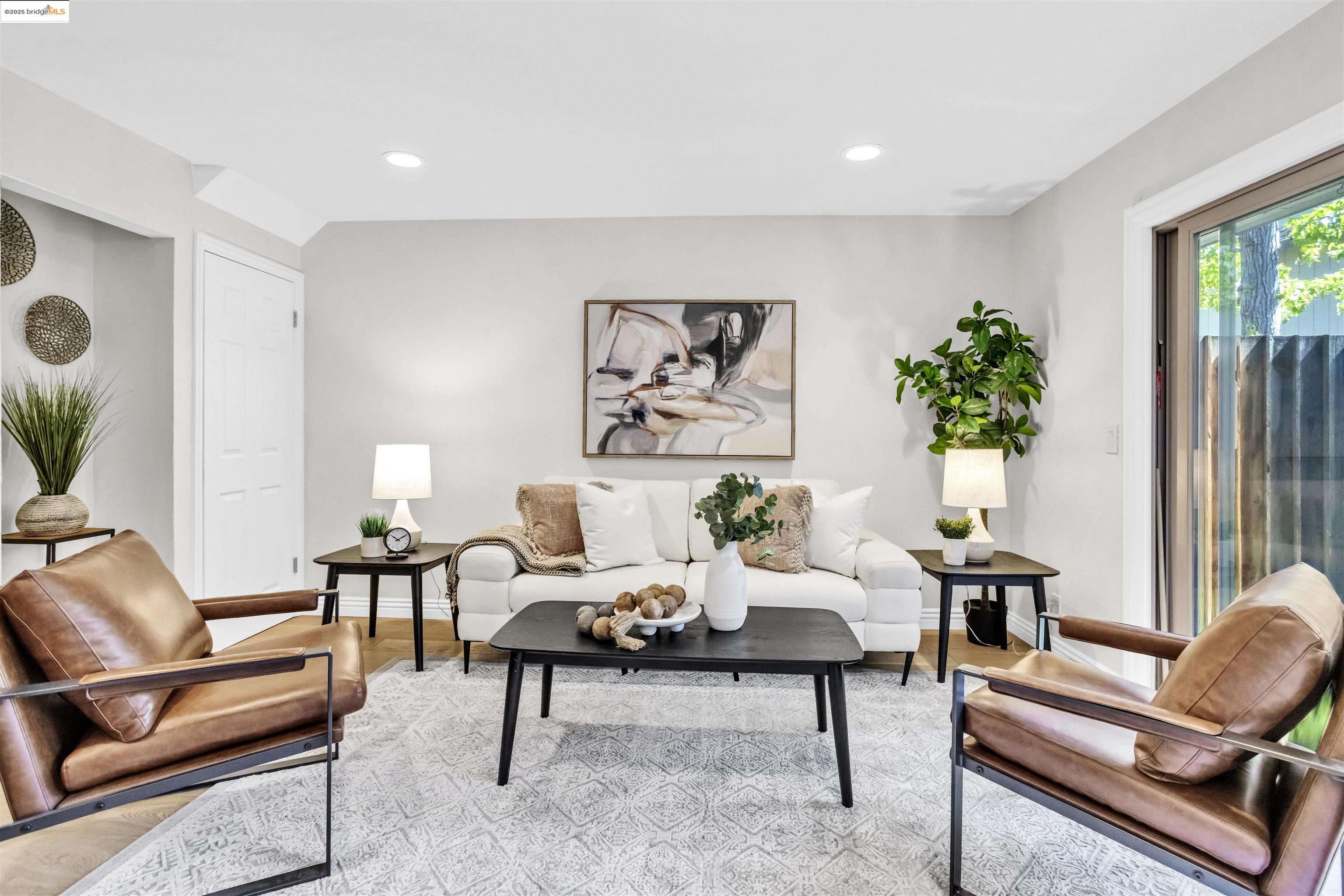 1905 Cannon Place Walnut Creek, CA 94597 - Photo 2 of 40 a living room with furniture and a potted plant