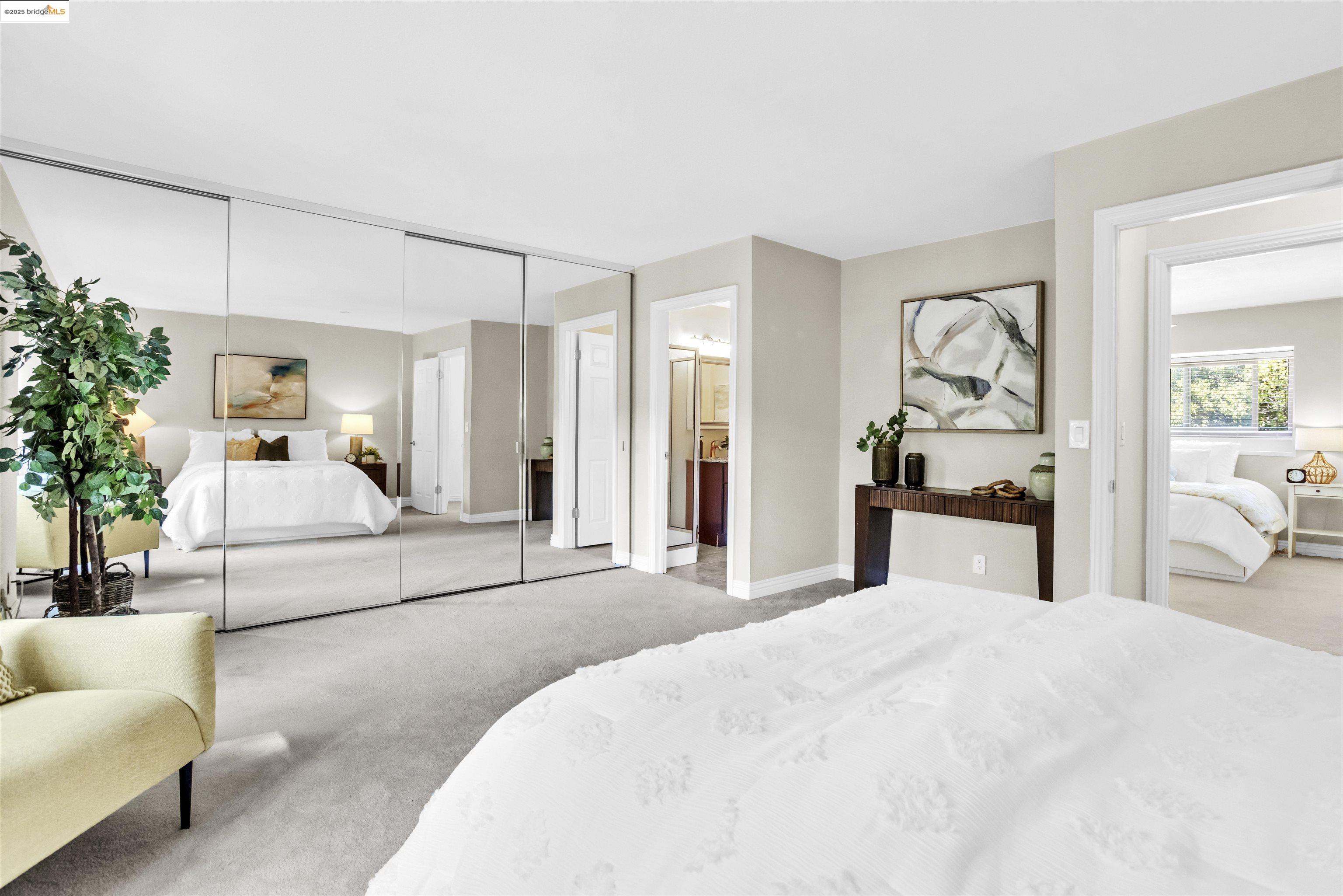 1905 Cannon Place Walnut Creek, CA 94597 - Photo 21 of 40 a bedroom with a large bed and a couch