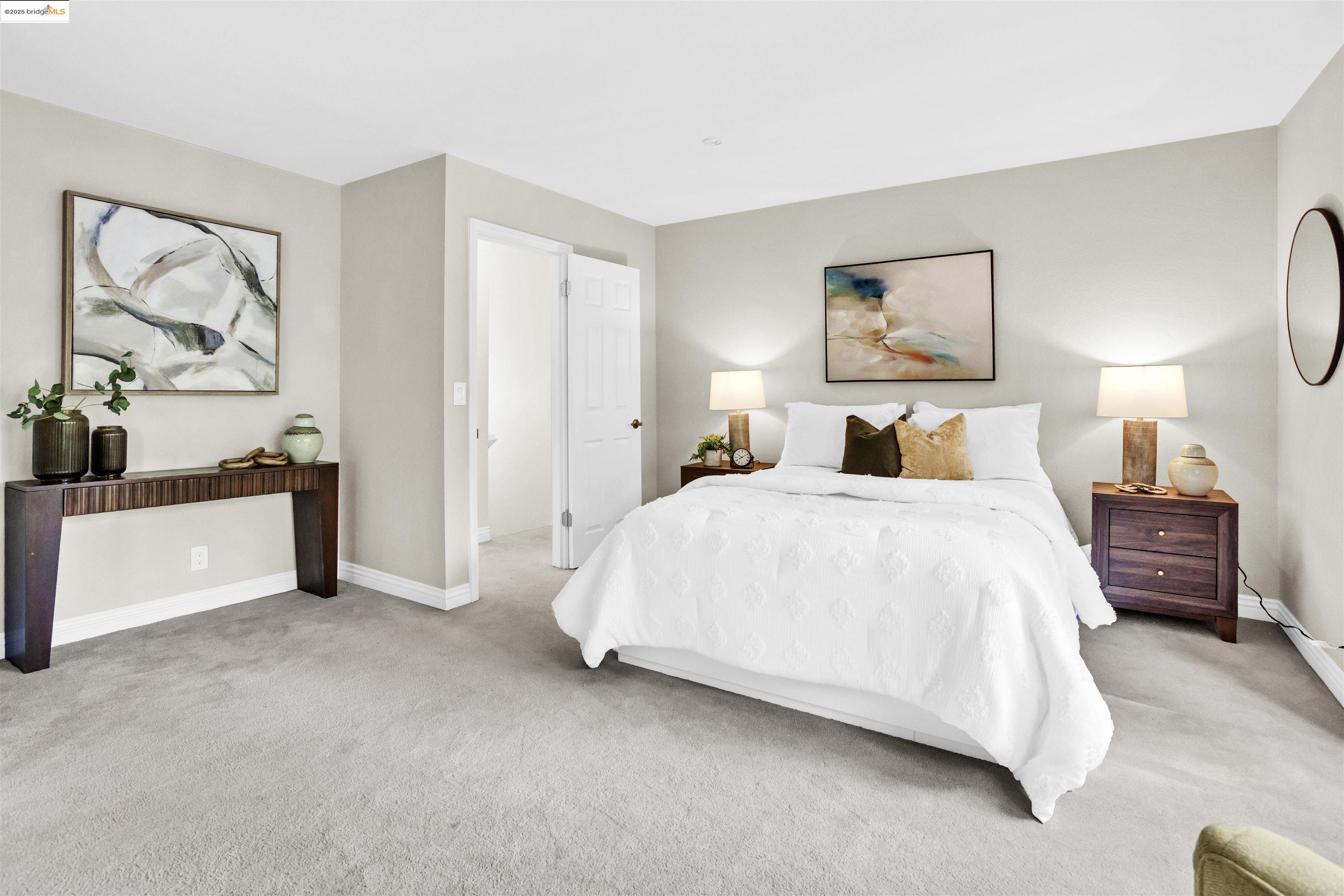 1905 Cannon Place Walnut Creek, CA 94597 - Photo 22 of 40 a spacious bedroom with a bed and a couch