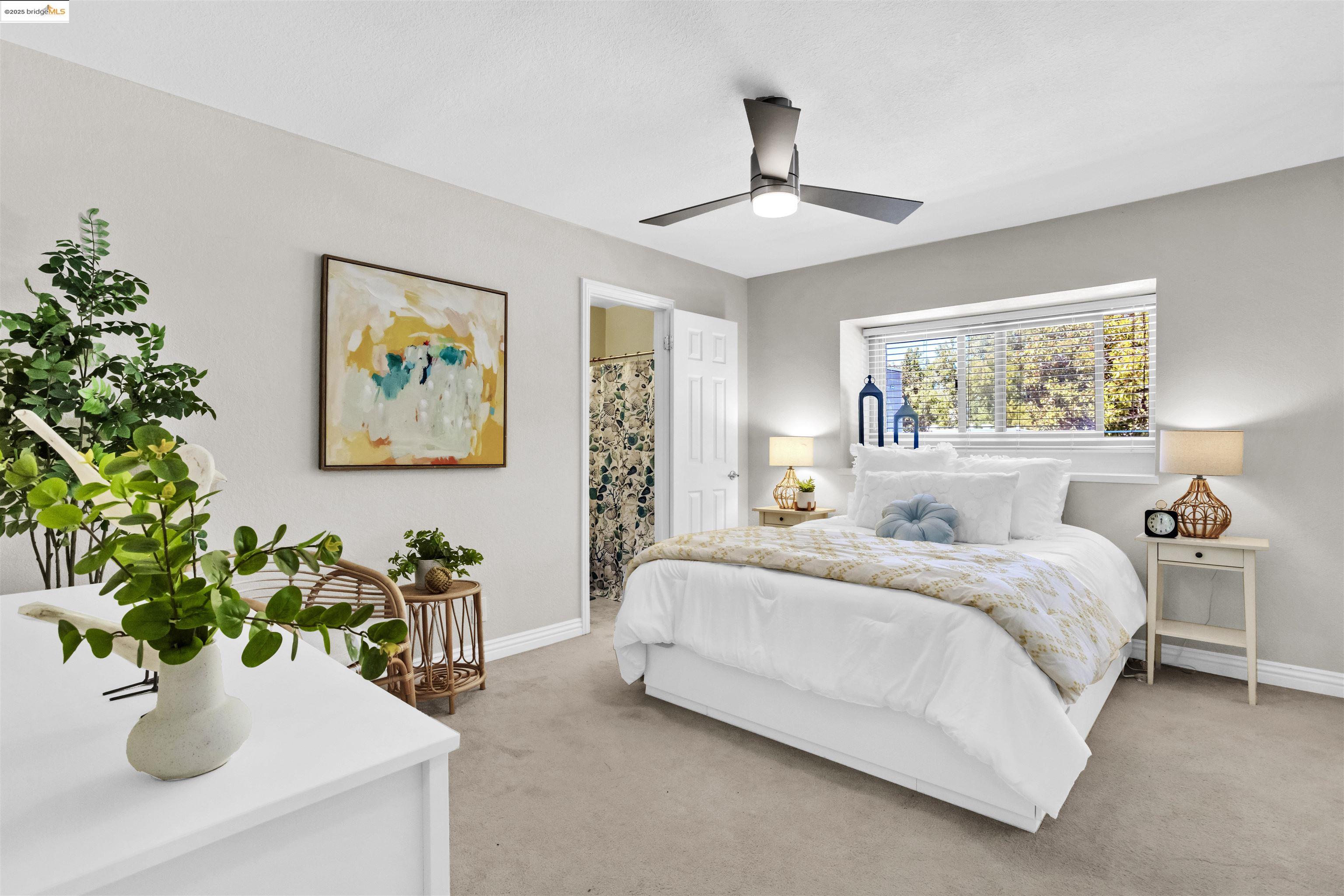 1905 Cannon Place Walnut Creek, CA 94597 - Photo 25 of 40 a bedroom with bed and a chandelier
