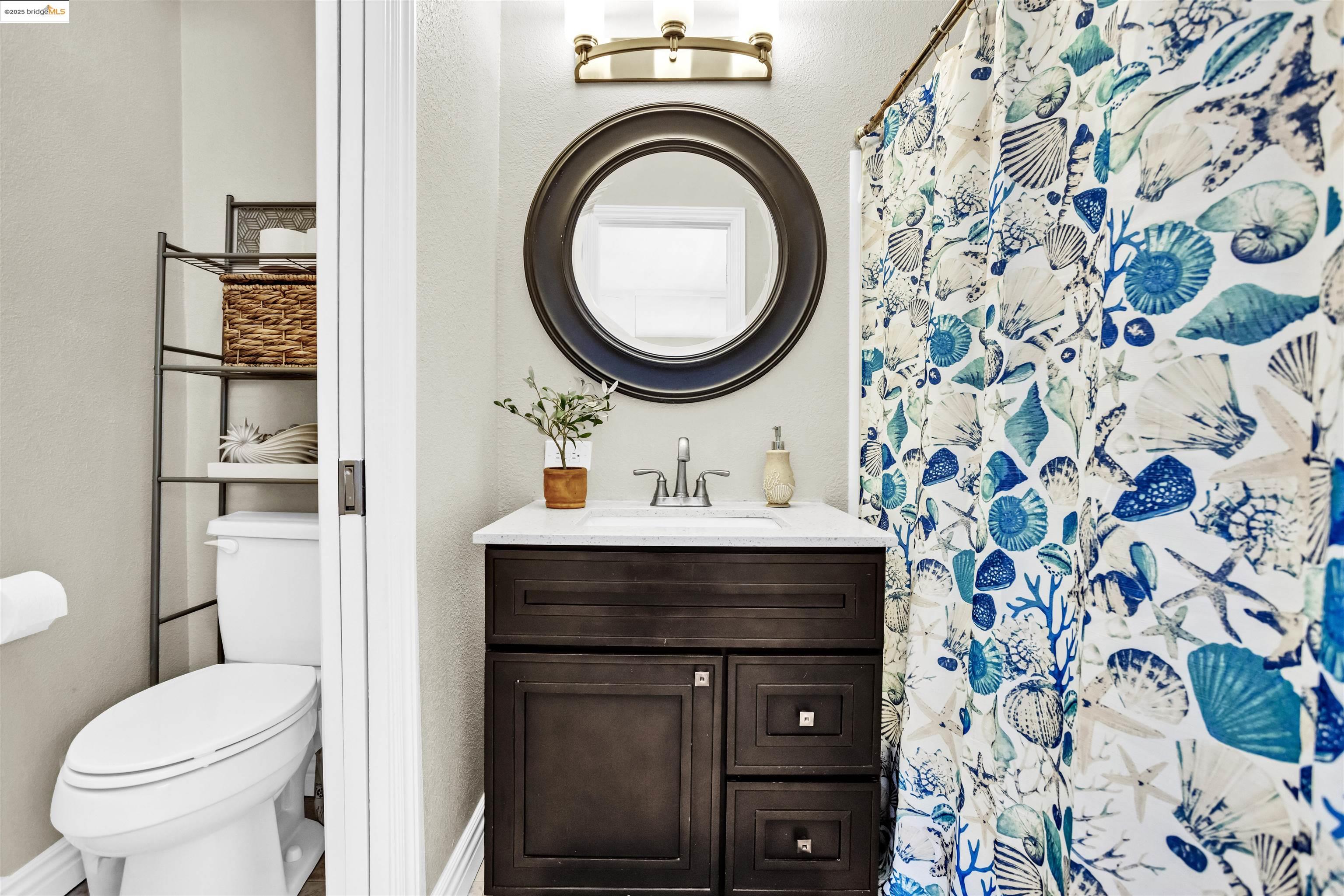 1905 Cannon Place Walnut Creek, CA 94597 - Photo 28 of 40 a bathroom with a sink and a mirror