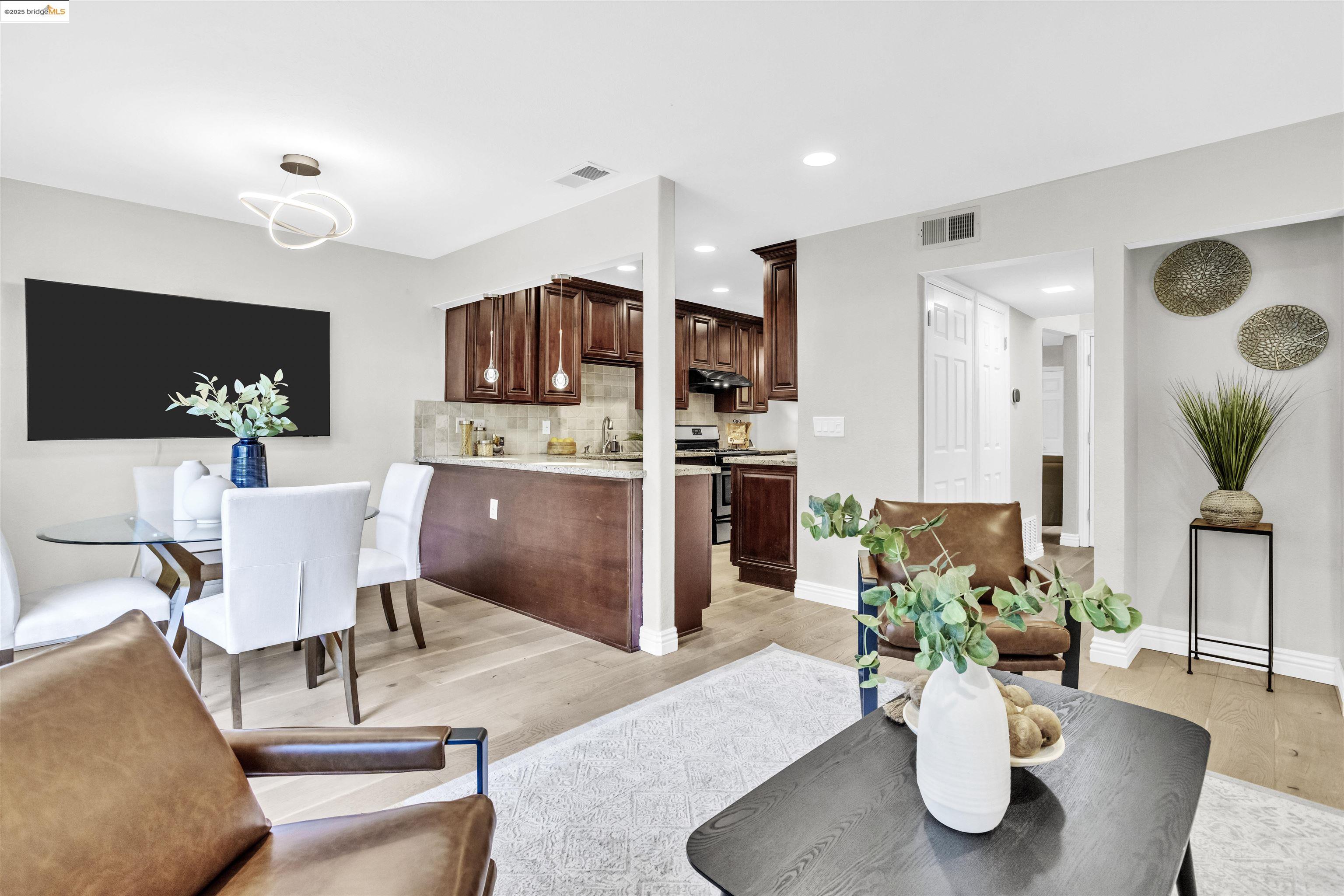 1905 Cannon Place Walnut Creek, CA 94597 - Photo 8 of 40 a kitchen with a table and chairs