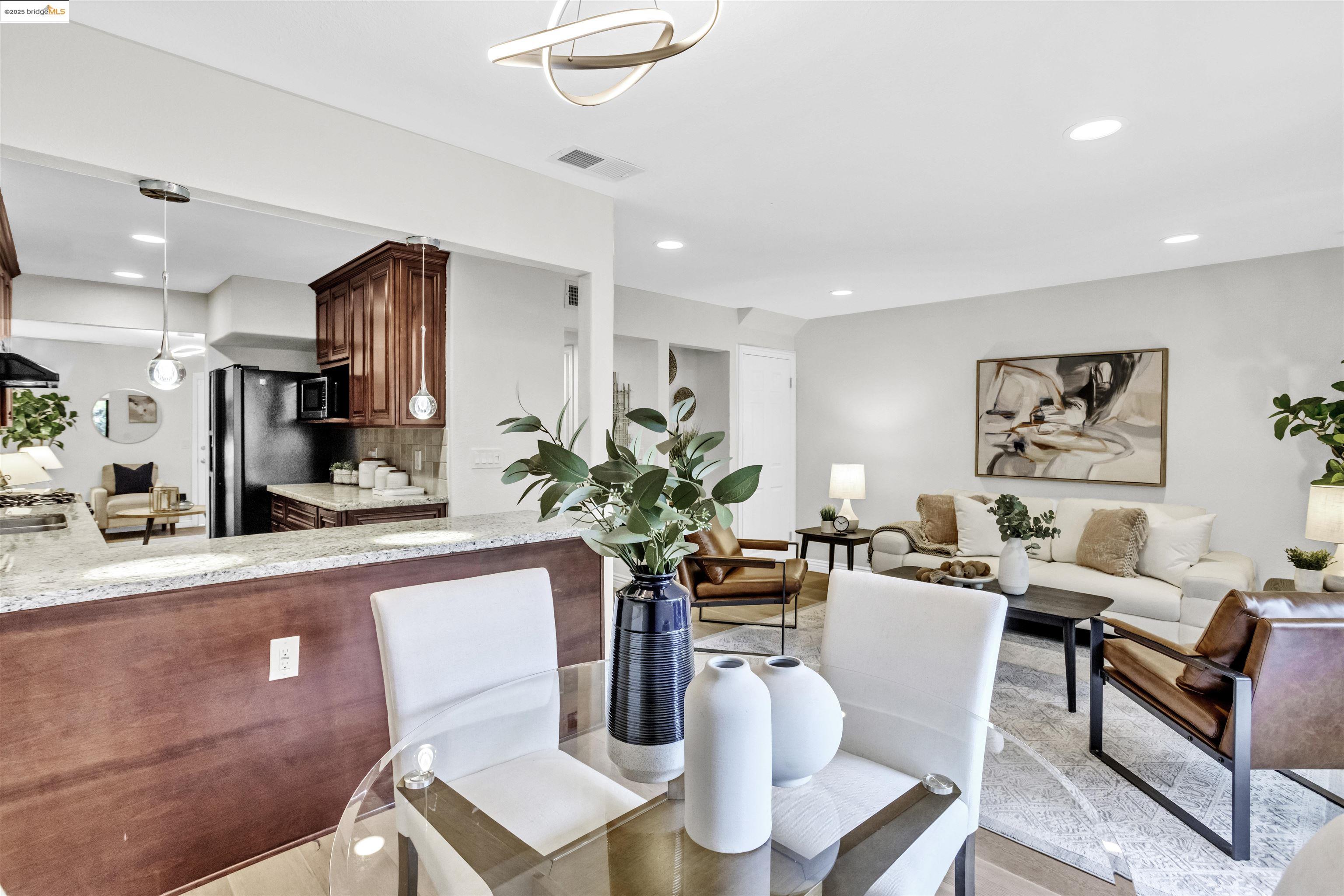 1905 Cannon Place Walnut Creek, CA 94597 - Photo 9 of 40 a living room with furniture a potted plant and kitchen view