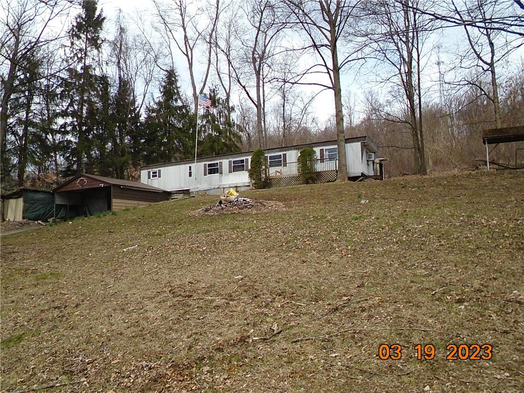 400 Bell Point Road Avonmore, PA 15618 - Photo 20 of 20 a view of a house with a yard