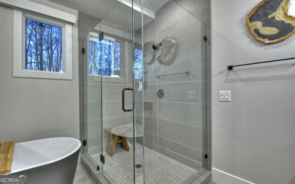 375 Blue Berry Ridge, Unit 2B Morganton, GA 30560 - Photo 12 of 61 a bathroom with a toilet and a shower