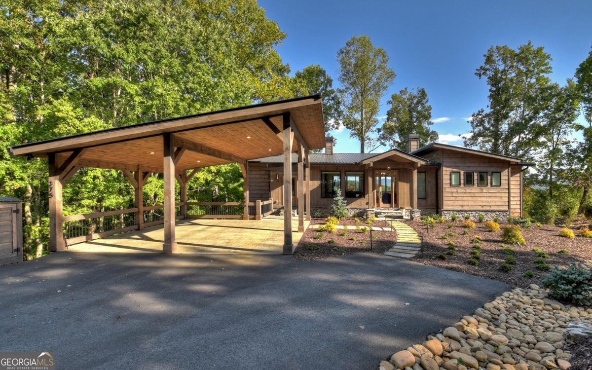 375 Blue Berry Ridge, Unit 2B Morganton, GA 30560 - Photo 34 of 61 a view of a house with backyard and sitting area