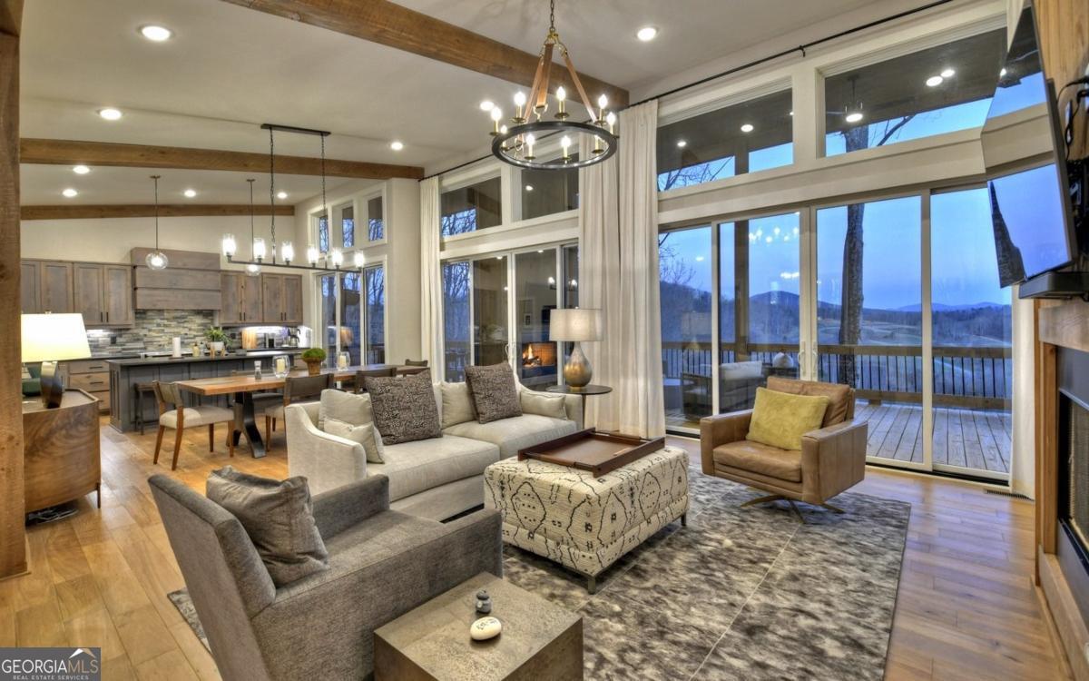 375 Blue Berry Ridge, Unit 2B Morganton, GA 30560 - Photo 54 of 61 a living room with furniture and a large window