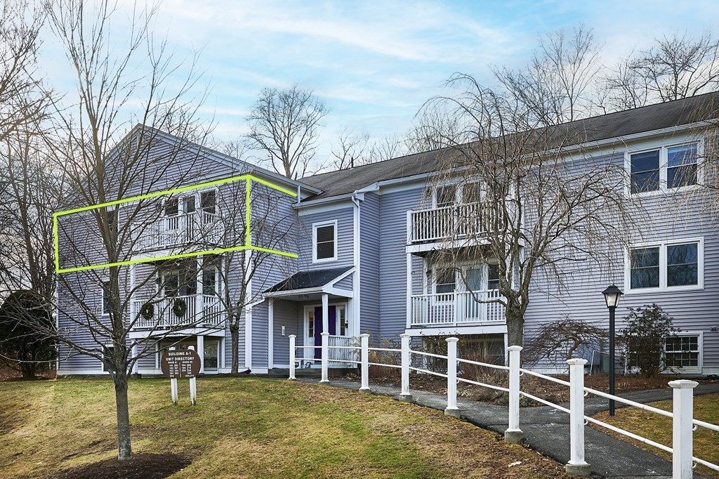 44 Evergreen Road, Unit 301 Leeds, MA 01053 - Photo 2 of 22 front view of a house with a yard