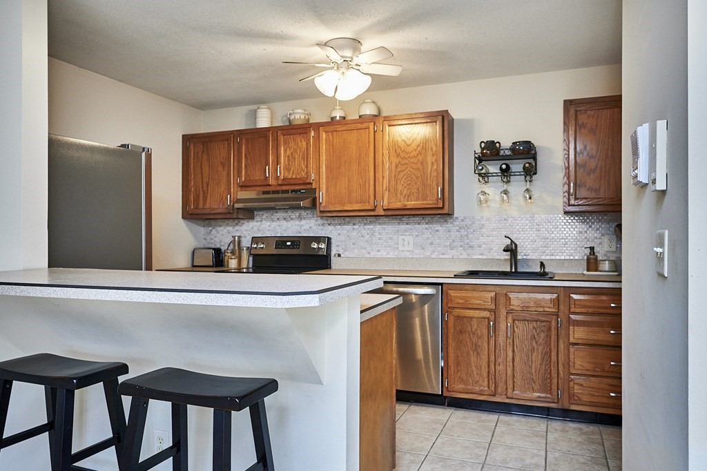 44 Evergreen Road, Unit 301 Leeds, MA 01053 - Photo 7 of 22 a kitchen with a sink cabinets and window