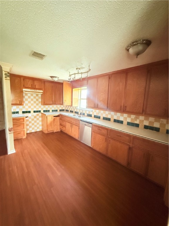 3831 Kendall Lane Waco, TX 76705 - Photo 12 of 13 a large kitchen with stainless steel appliances a large counter top a stove a sink and a refrigerator