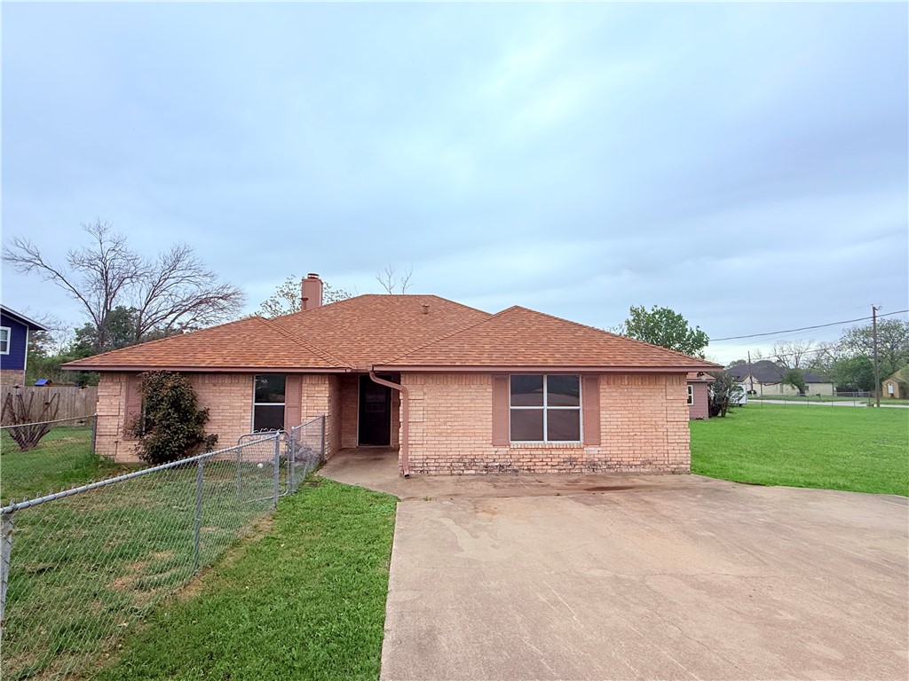 3831 Kendall Lane Waco, TX 76705 - Photo 4 of 13 front view of a house with a yard
