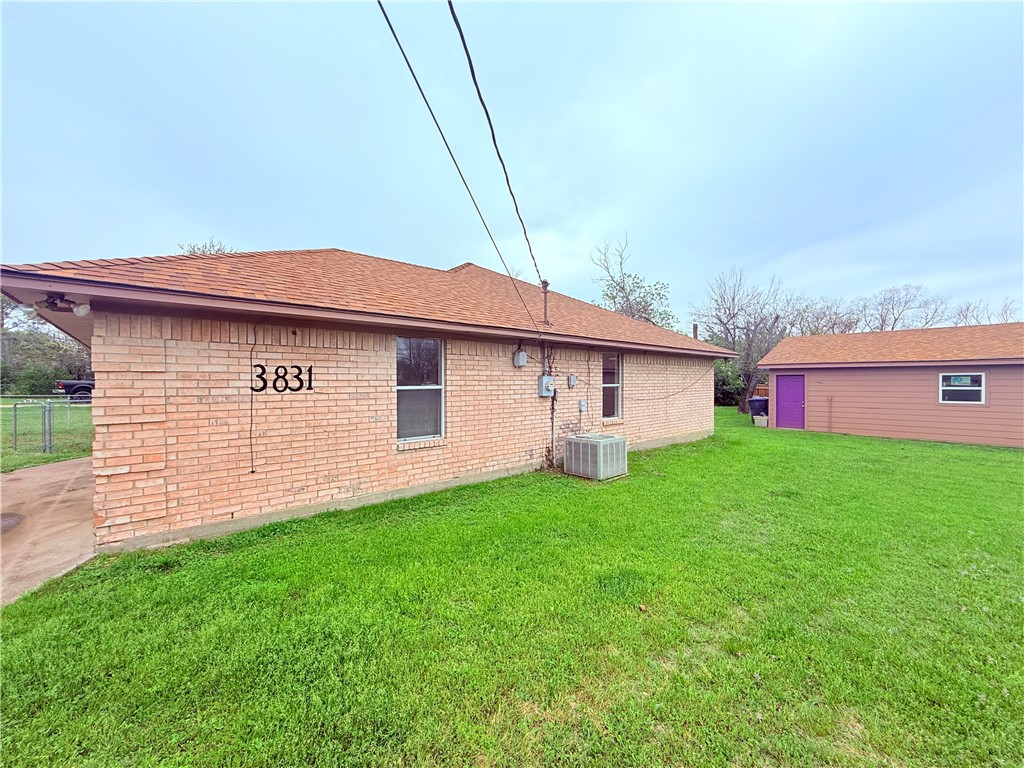 3831 Kendall Lane Waco, TX 76705 - Photo 9 of 13 a view of a house with a backyard