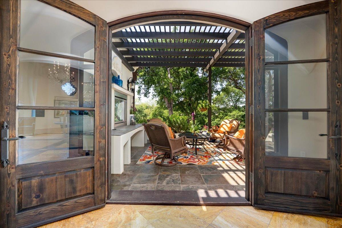 217 Rue Esperanza Lincoln, CA 95648 - Photo 18 of 71 Doors from dining room hallway leading to outdoor seating and additional dining venue.