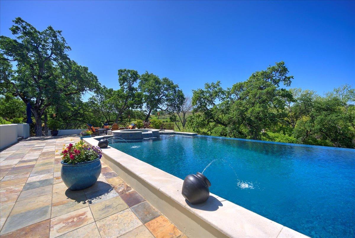 217 Rue Esperanza Lincoln, CA 95648 - Photo 48 of 71 51-foot long infinity edge pool with spa and fountains. Completely remodeled in 2025.