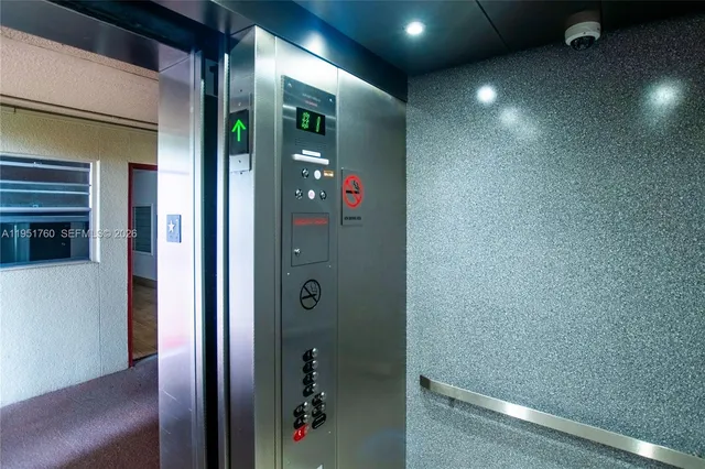 a view of hallway with washer and dryer