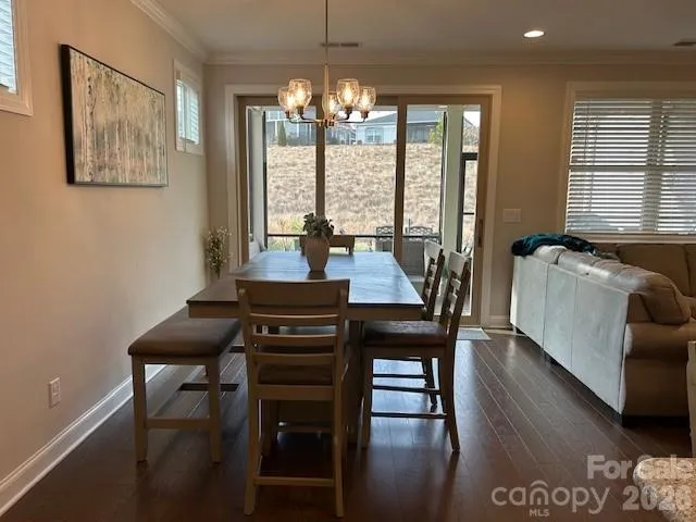 a living room with fireplace furniture and a flat screen tv