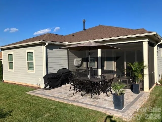 a front view of a house with patio