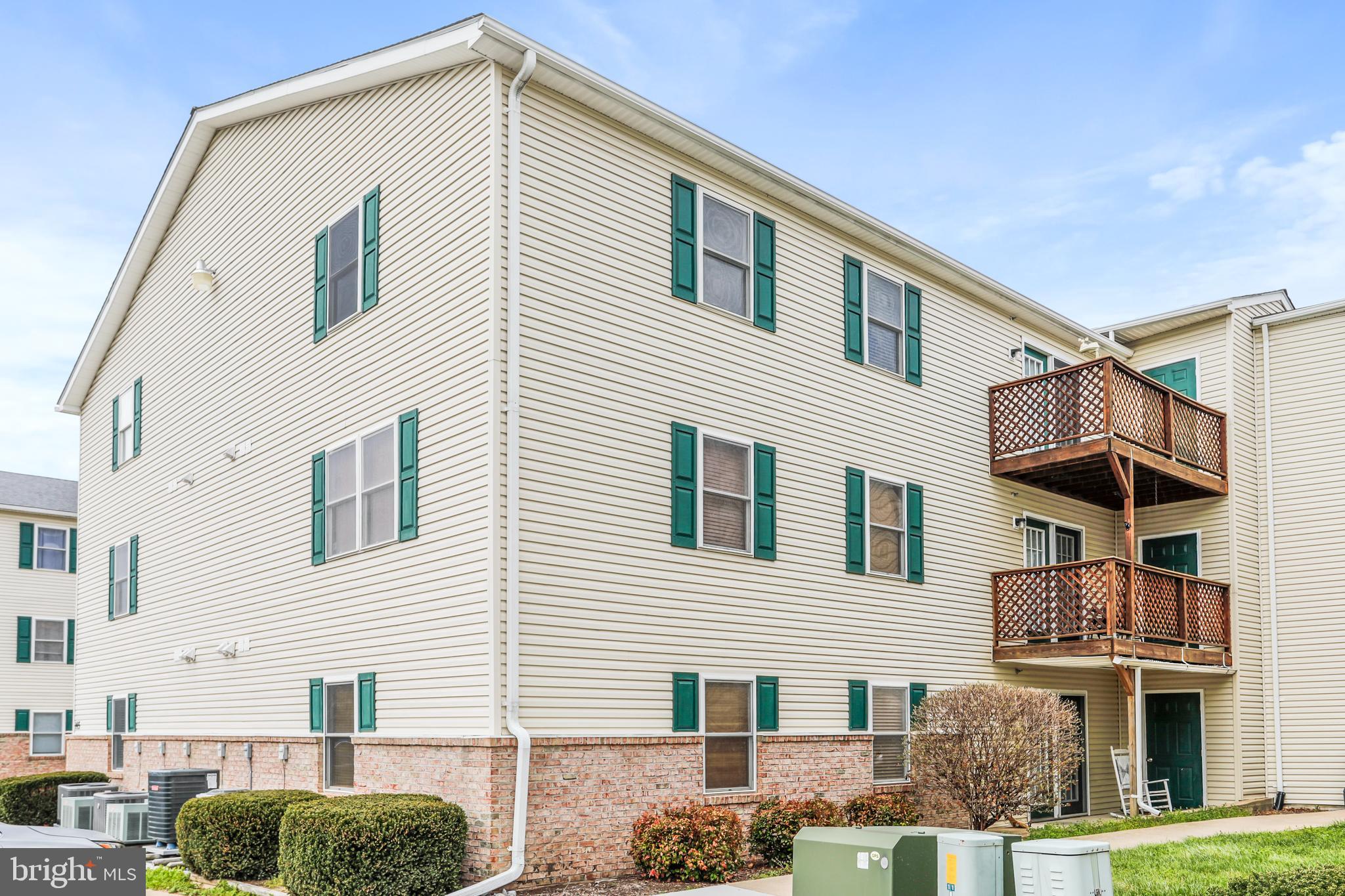 145 Hailey Lane, Unit F11 Strasburg, VA 22657 - Photo 1 of 39 a front view of residential houses with stairs