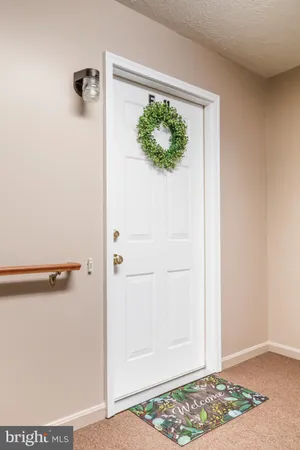 a view of a hallway with closet
