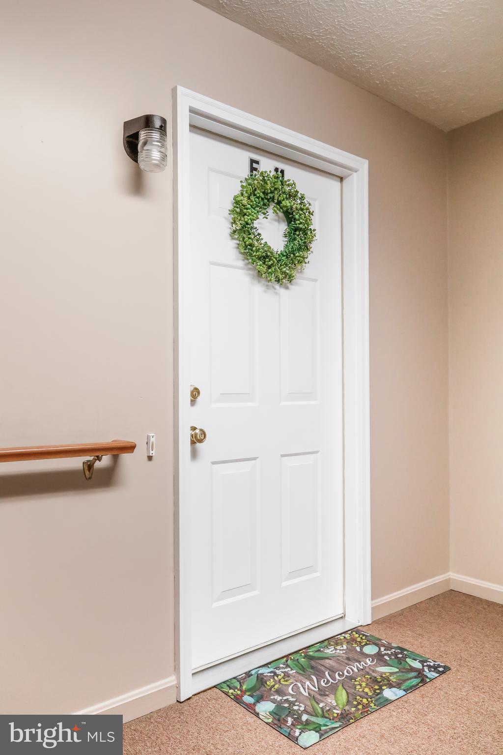 145 Hailey Lane, Unit F11 Strasburg, VA 22657 - Photo 3 of 39 a view of a hallway with closet
