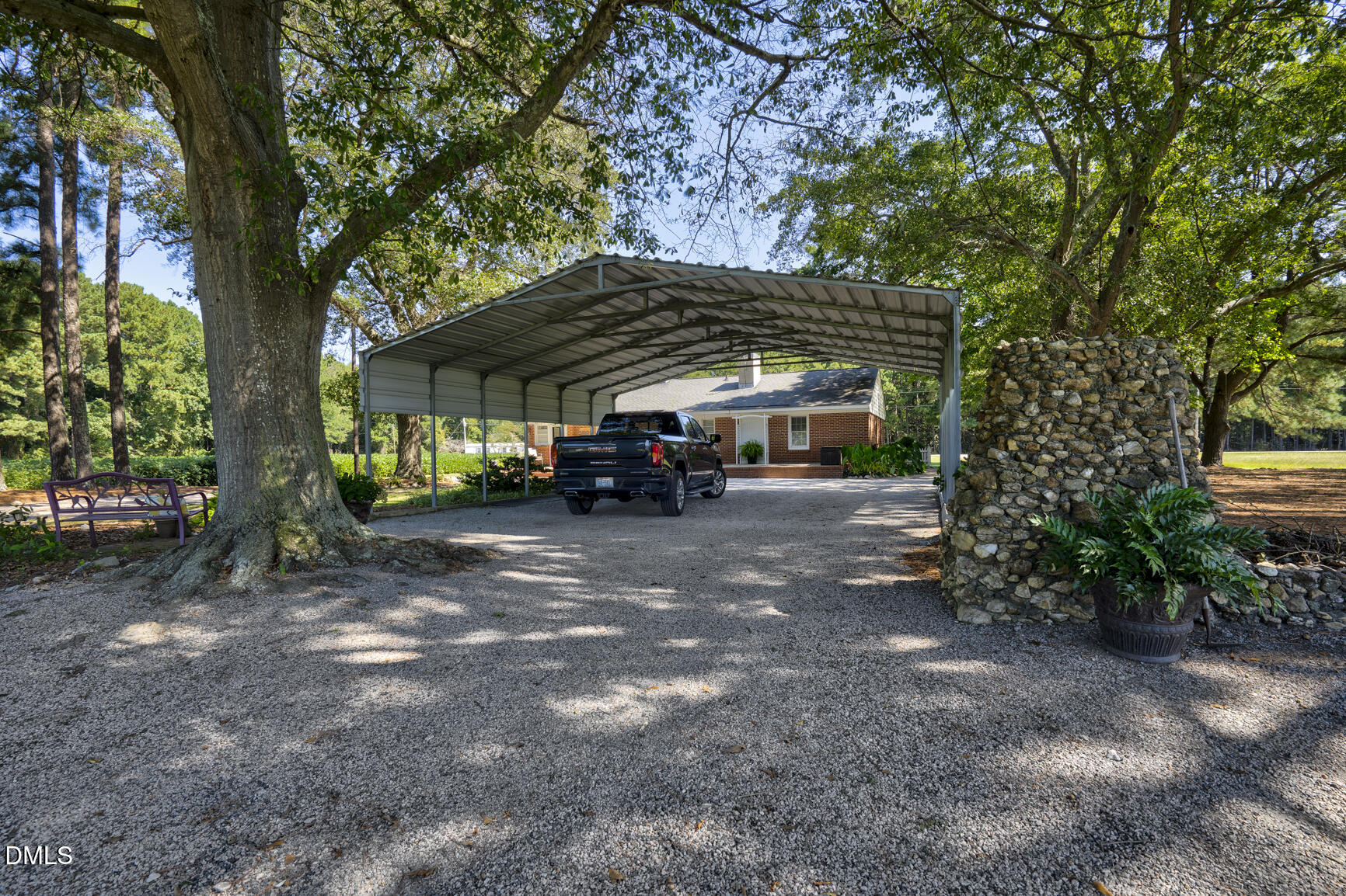 6515 Tonya Road Elm City, NC 27822 - Photo 24 of 52 a view of house with car parked beside of it
