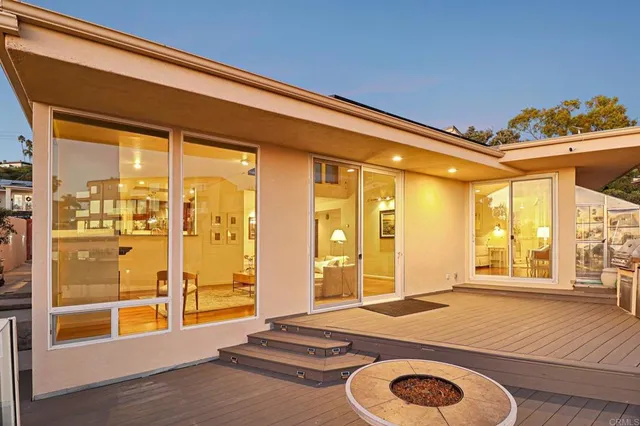 a front view of a house with outdoor space