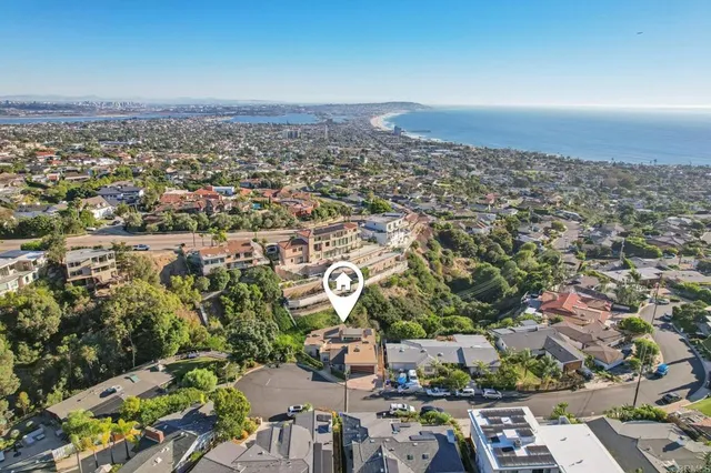 an aerial view of a city with lots of residential buildings