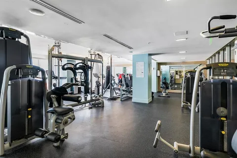 a view of a room with gym equipment
