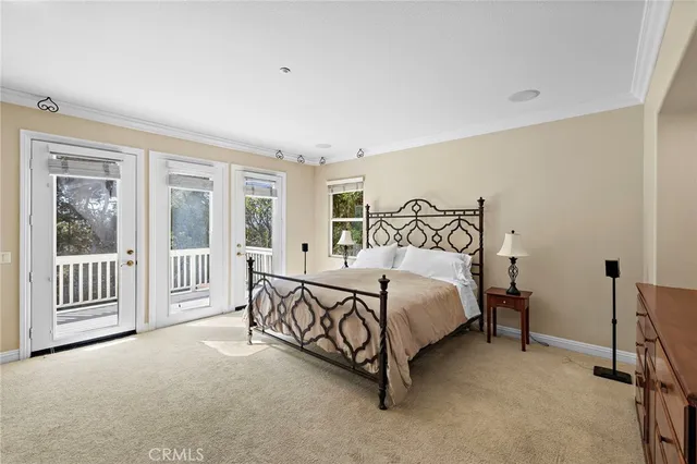 a view of balcony with wooden floor and fence