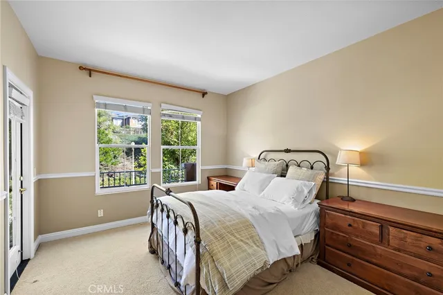 a bathroom with a sink double vanity and a mirror