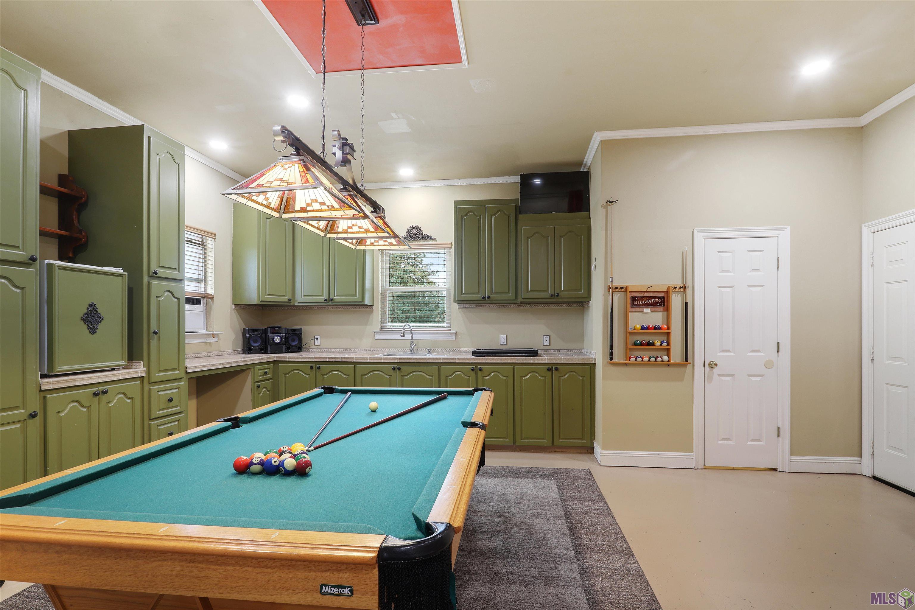 18654 Perkins Road East Prairieville, LA 70769 - Photo 21 of 25 Game Room off Garage