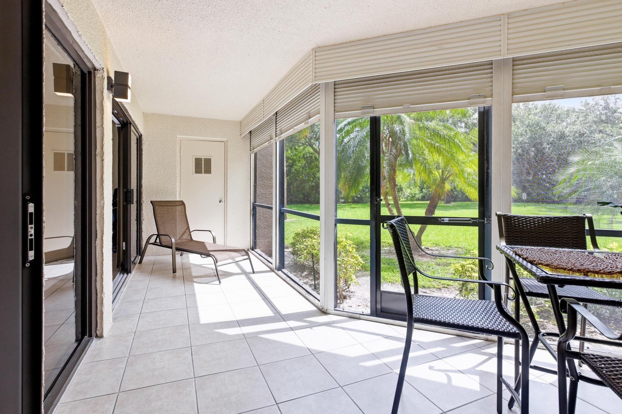 5800 Camino Del Sol, Unit 106 Boca Raton, FL 33433 - Photo 12 of 36 PATIO, IMPACT SLIDERS