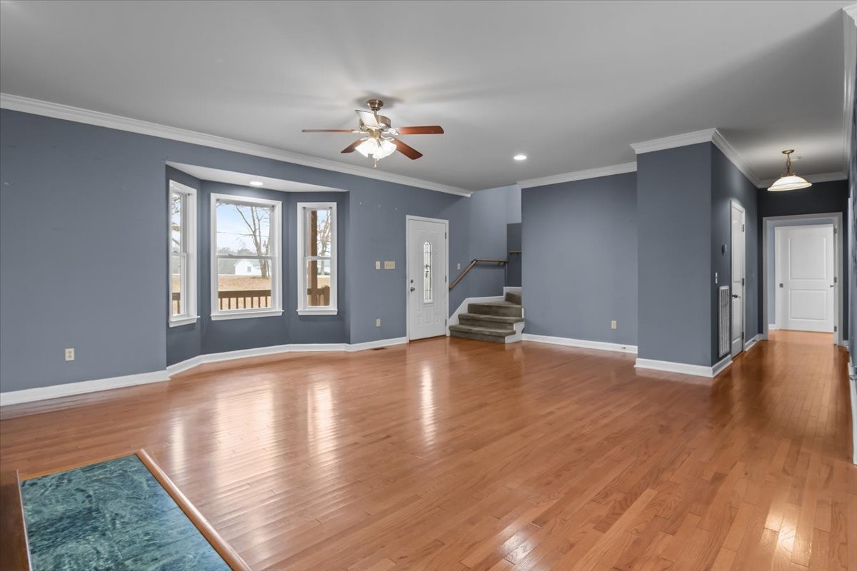 1077 Claylick Road White Bluff, TN 37187 - Photo 14 of 49 a view of an empty room with window and wooden floor