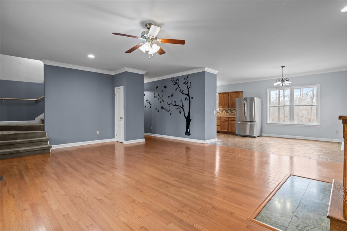 1077 Claylick Road White Bluff, TN 37187 - Photo 15 of 49 a view of an empty room with window and wooden floor