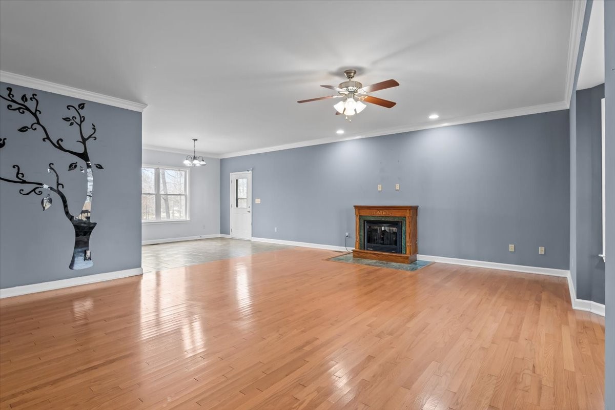 1077 Claylick Road White Bluff, TN 37187 - Photo 16 of 49 a view of an empty room with window and wooden floor