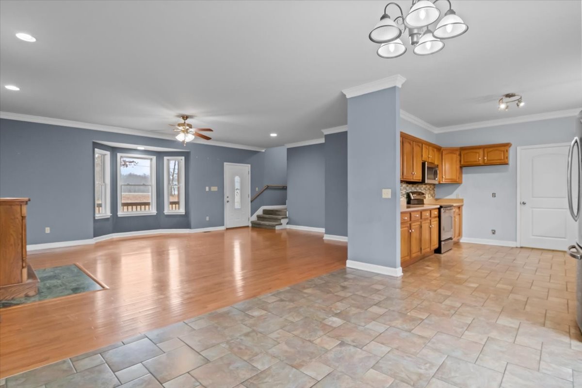 1077 Claylick Road White Bluff, TN 37187 - Photo 19 of 49 a view of an empty room with kitchen and window