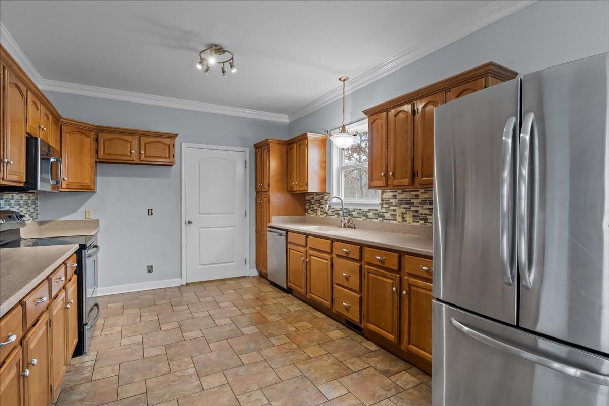 1077 Claylick Road White Bluff, TN 37187 - Photo 20 of 49 a large kitchen with cabinets and stainless steel appliances