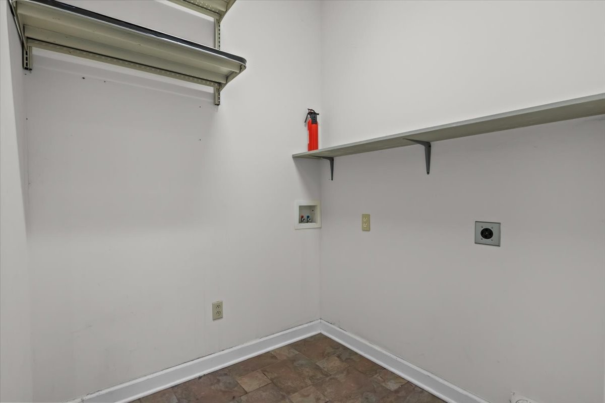 1077 Claylick Road White Bluff, TN 37187 - Photo 22 of 49 a view of small space with racks on the wall
