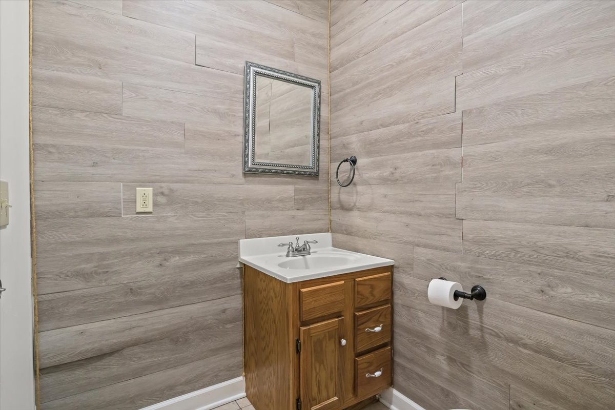 1077 Claylick Road White Bluff, TN 37187 - Photo 24 of 49 a bathroom with a sink toilet and shower
