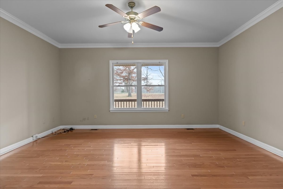 1077 Claylick Road White Bluff, TN 37187 - Photo 27 of 49 wooden floor in an empty room with a window