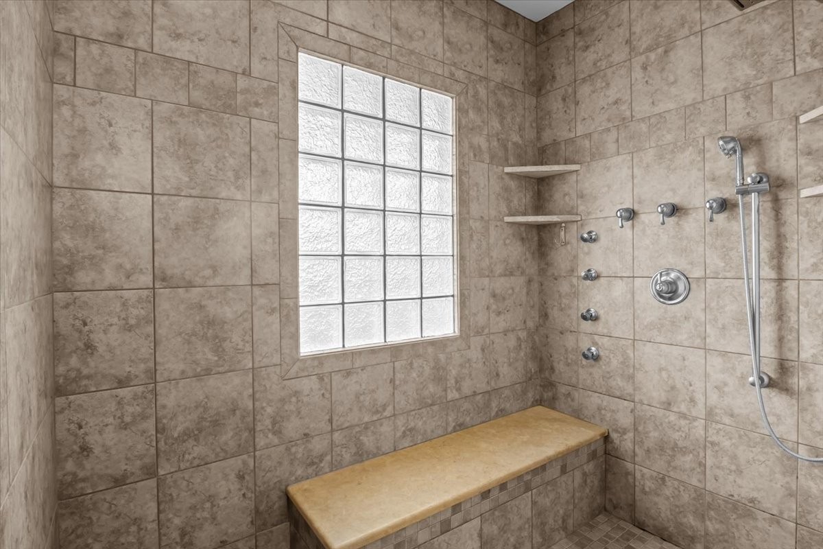 1077 Claylick Road White Bluff, TN 37187 - Photo 29 of 49 a bathroom with a bath tub and a shower