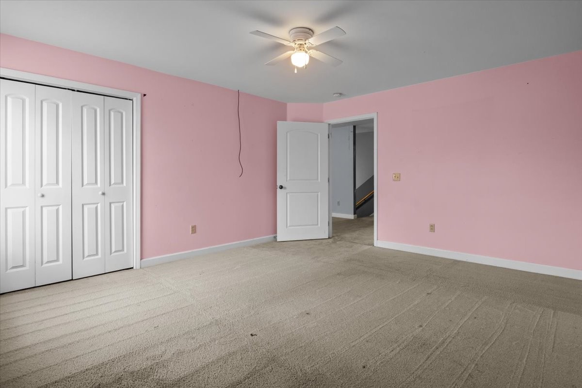 1077 Claylick Road White Bluff, TN 37187 - Photo 35 of 49 an empty room with a ceiling fan and a window