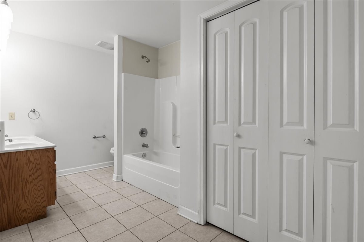 1077 Claylick Road White Bluff, TN 37187 - Photo 36 of 49 a bathroom with a bathtub and a shower