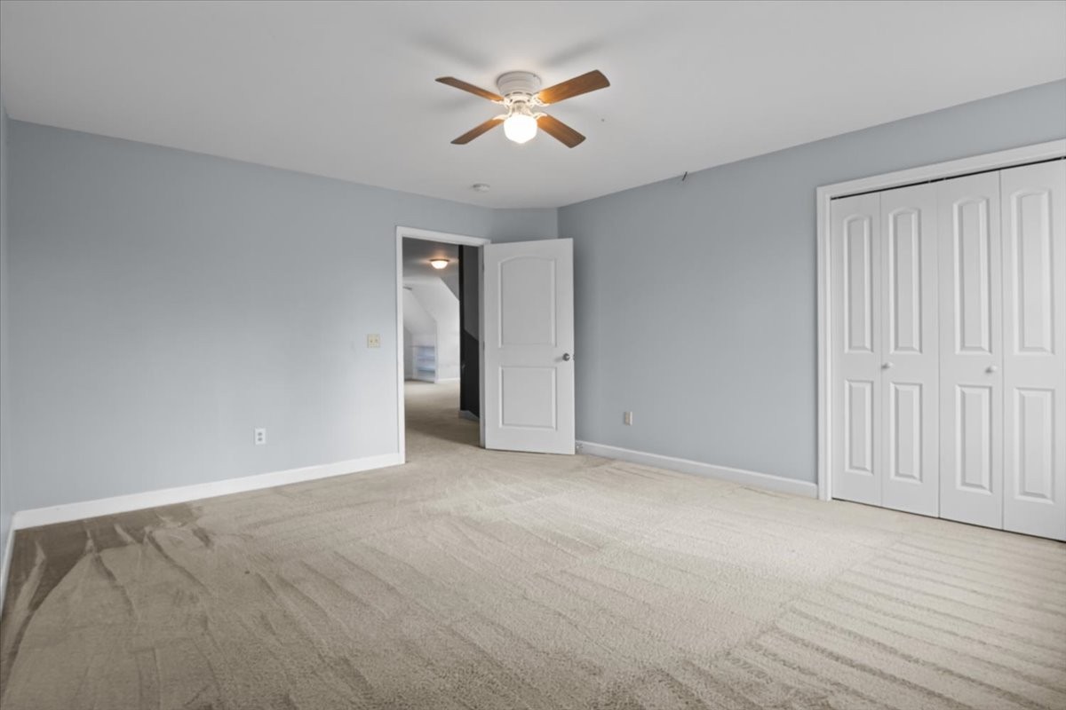 1077 Claylick Road White Bluff, TN 37187 - Photo 40 of 49 an empty room with closet and a ceiling fan