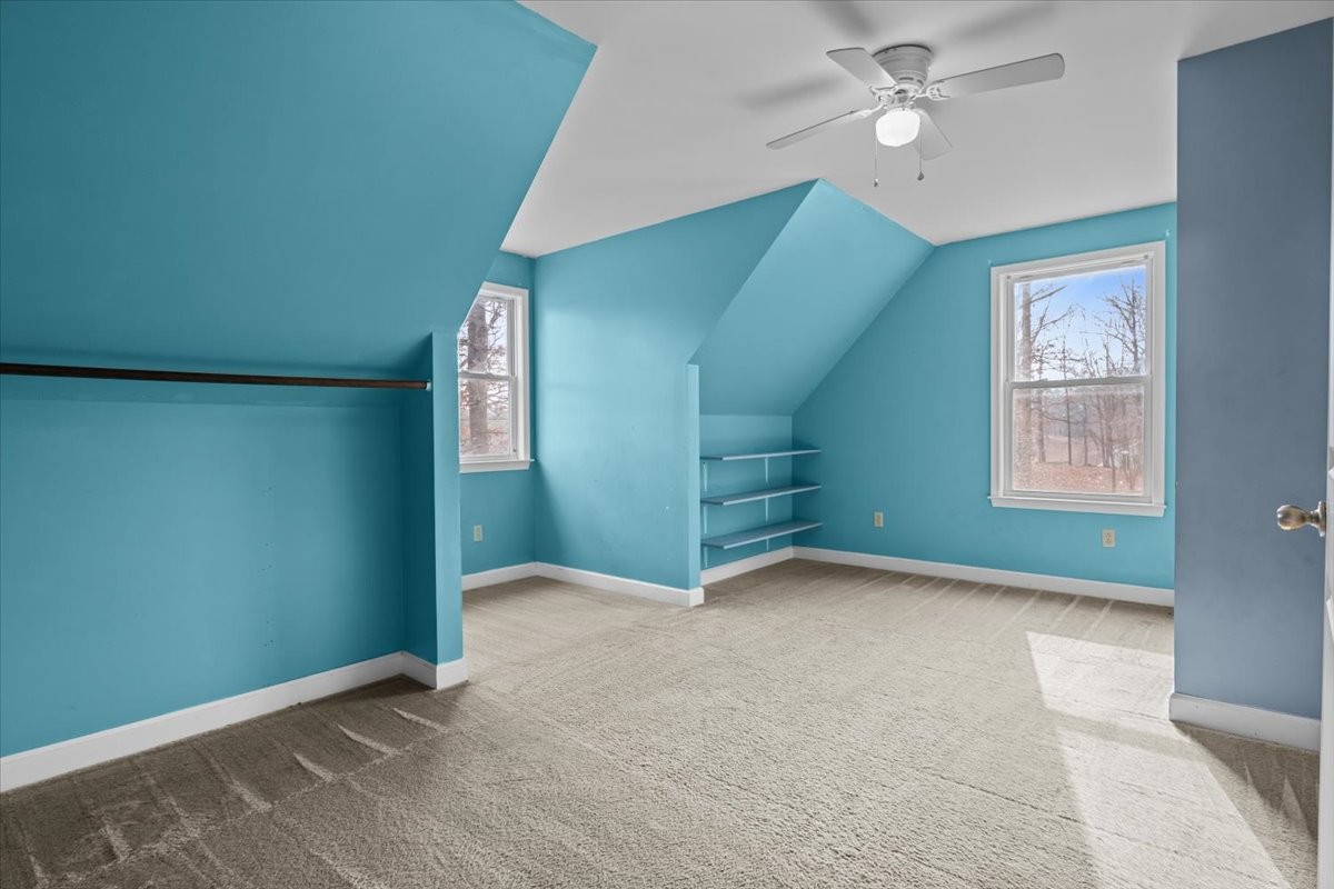 1077 Claylick Road White Bluff, TN 37187 - Photo 41 of 49 an empty room with windows and fan